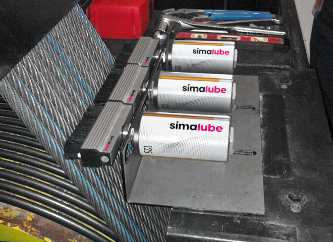 The simalube lubrication system, consisting of three simalube lubricators and three breasts, automatically and continuously oil, maintain and clean the ropes for up to one year.