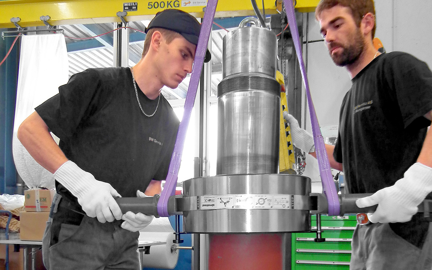 A heated large deep groove ball bearing is mounted on the turbine shaft using the simatool Bearing Handling Tool.