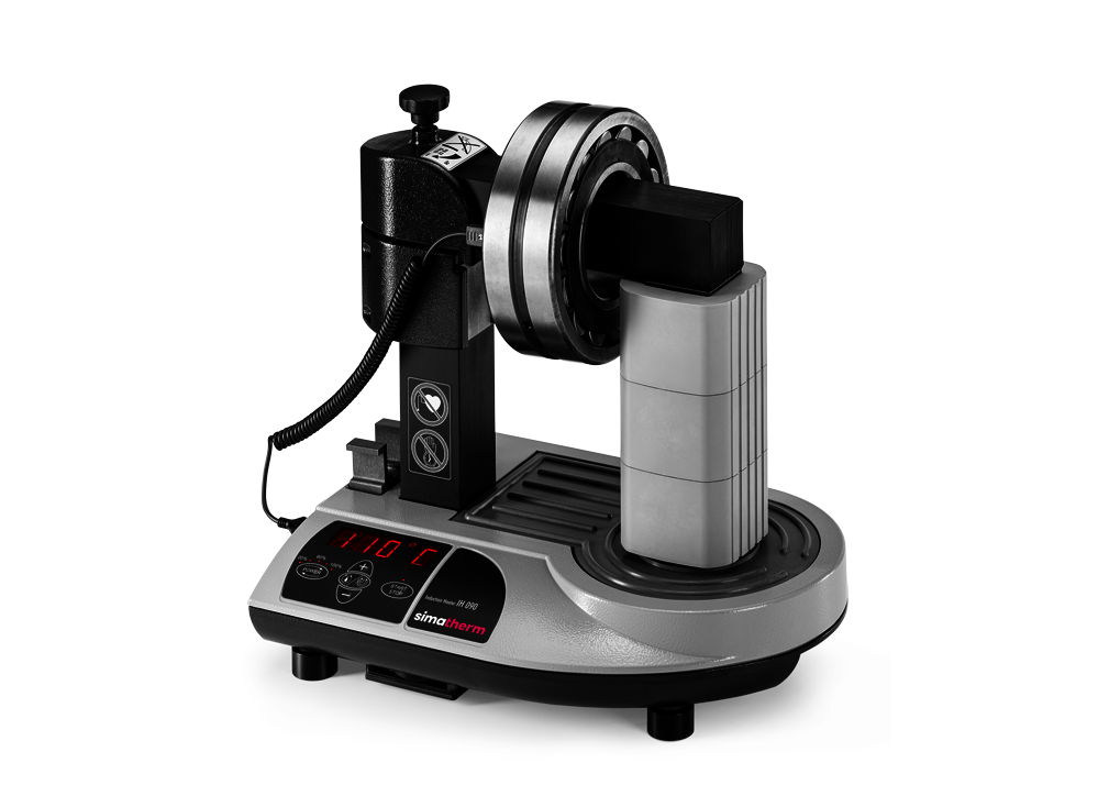 The simatherm IH 090 induction heater heats a deep groove ball bearing over the large support yoke. The target temperature is set to 110 °C. 