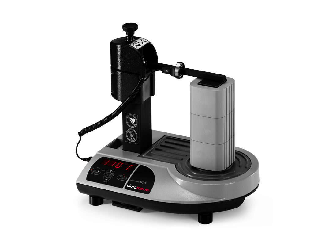 The simatherm IH 090 induction heater heats a deep groove ball bearing over the small support yoke. The target temperature is set to 110 °C. 