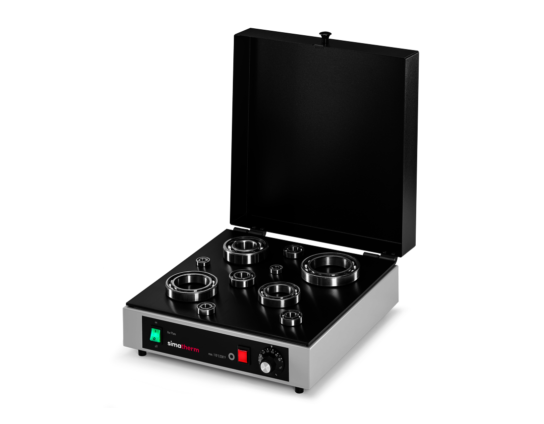 The simatherm Hot Plate large heats several deep groove ball bearings on the heating plate. The target temperature is set to 110 °C.